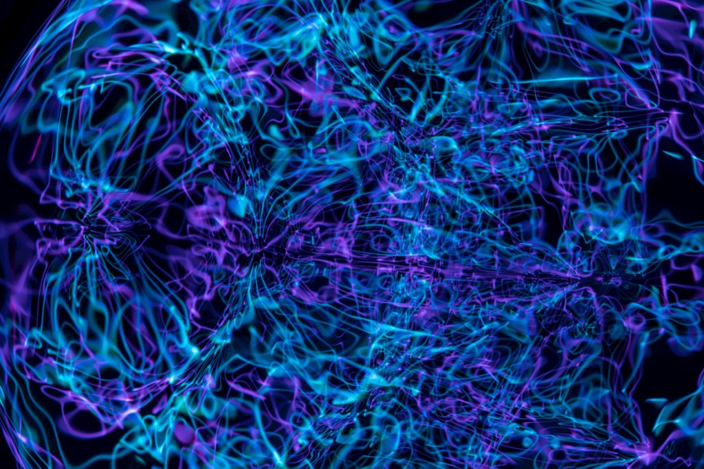 pexels-photo-10827984-10827984 Dynamic abstract image with swirling neon lines creating vibrant, colorful patterns.